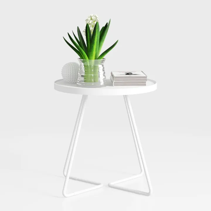 A modern minimalist circular dining table with a 4